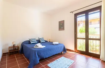 Letto o letti in una camera di Casa del Lentischio