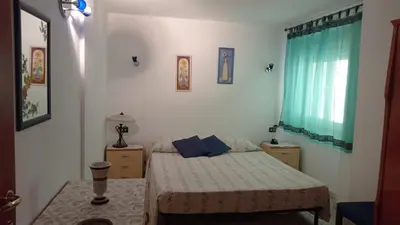 Letto o letti in una camera di Casa Luisa