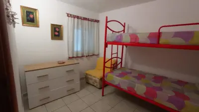 Letto o letti in una camera di Casa Luisa