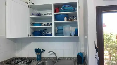 Cucina o angolo cottura di APPARTAMENTO CIELO pochi passi dal mare