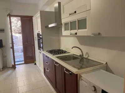Cucina o angolo cottura di Appartamento Tramonto 2 minuti dal mare