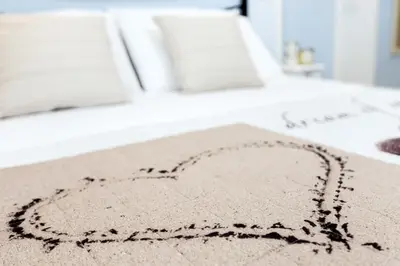 Letto o letti in una camera di Onda Marina Rooms