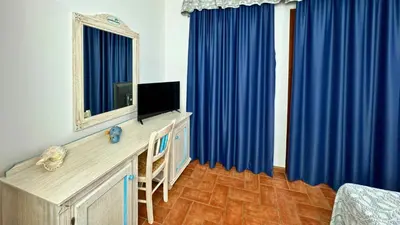 TV o dispositivi per l'intrattenimento presso Hotel le Sabbie
