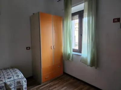 Letto o letti in una camera di Appartamento In Centro