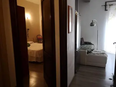 Letto o letti in una camera di Appartamento In Centro
