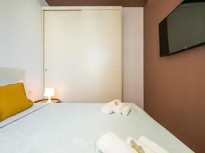 Letto o letti in una camera di Studio Noir
