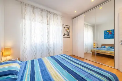 Letto o letti in una camera di Spacious and bright 2 BR apartment near Poetto