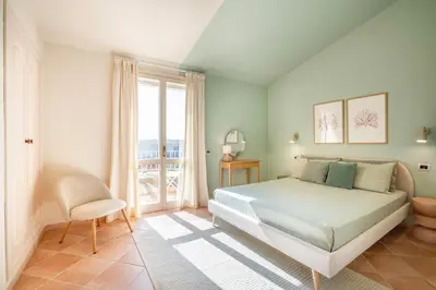 Letto o letti in una camera di Villa Lolly