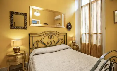 Letto o letti in una camera di Roma 93
