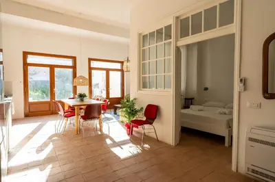 Letto o letti in una camera di Casa Tharros