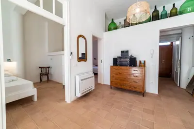 Letto o letti in una camera di Casa Tharros