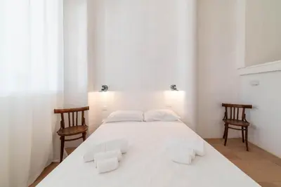 Letto o letti in una camera di Casa Tharros