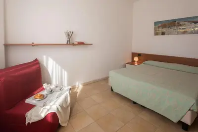 Letto o letti in una camera di Stylish Residence Le Fontane 1 BedrApt B3 sleeps 3