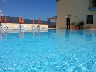 Piscina di Stylish Residence Le Fontane 1 BedrApt B4 sleeps 4 o nelle vicinanze