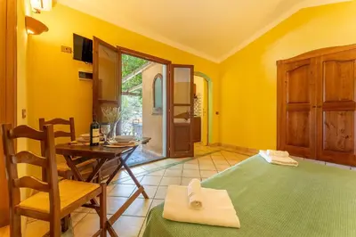 TV o dispositivi per l'intrattenimento presso Classical Res BaiaDellePalme-Studio sleep 2 person