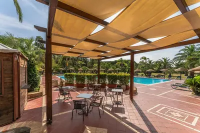 Piscina di Classical Res Baia Delle Palme Prem Bilo 4 person o nelle vicinanze