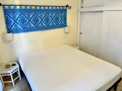 Letto o letti in una camera di App Emily By La Via Del Mare Viaggi e Vacanze Villasimius