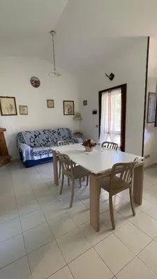 Area soggiorno di Holiday House Gioia