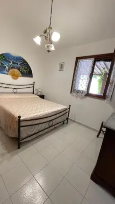 Letto o letti in una camera di Holiday House Gioia