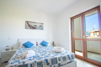 Letto o letti in una camera di Villa Cycas