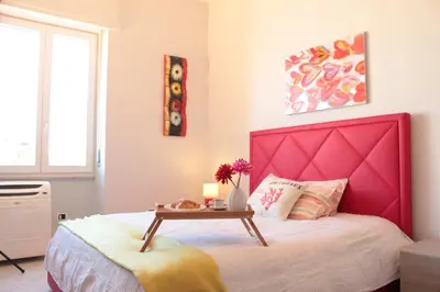 Letto o letti in una camera di Casa Tiziano