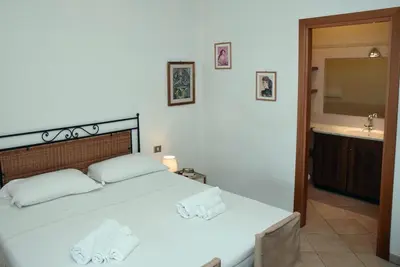 Letto o letti in una camera di Casa Mistral By La Via Del Mare Viaggi e Vacanze
