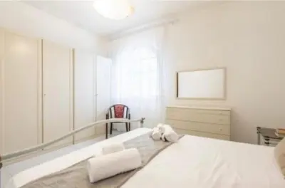Letto o letti in una camera di Mare in pineta a due passi dal mare