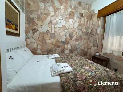 Letto o letti in una camera di Elements