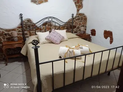 Letto o letti in una camera di Casa Corona