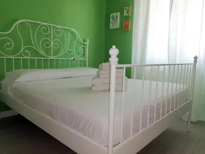 Letto o letti in una camera di CASA Vacanze Brezza Marina Piras Maria Cristiana