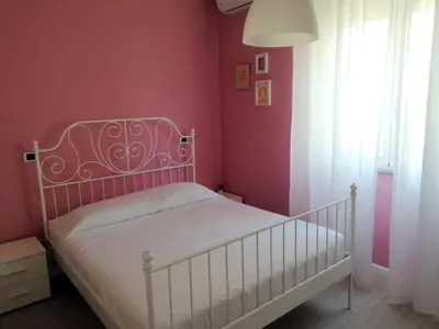 Letto o letti in una camera di CASA Vacanze Brezza Marina Piras Maria Cristiana