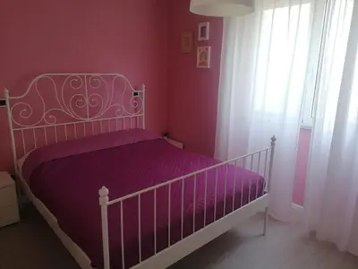 Letto o letti in una camera di CASA Vacanze Brezza Marina Piras Maria Cristiana