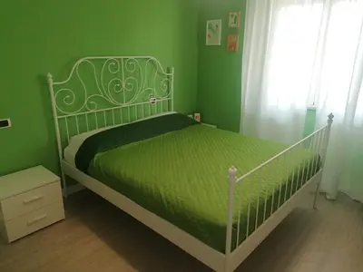 Letto o letti in una camera di CASA Vacanze Brezza Marina Piras Maria Cristiana