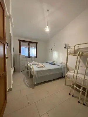 Letto o letti in una camera di La perla del mare