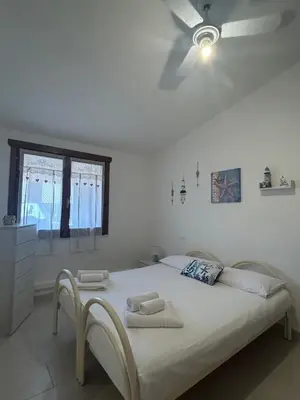 Letto o letti in una camera di La perla del mare