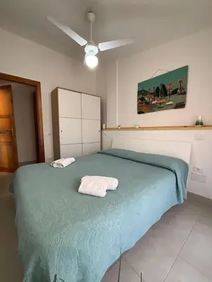 Letto o letti in una camera di La perla del mare