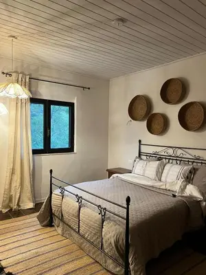 Letto o letti in una camera di MASUA HOUSE PRESTIGE-two minutes from the sea
