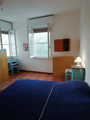 Letto o letti in una camera di Vista mare