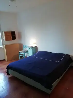 Letto o letti in una camera di Vista mare