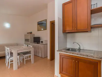Cucina o angolo cottura di Holiday Home Case Stelle Marine - REI217 by Interhome