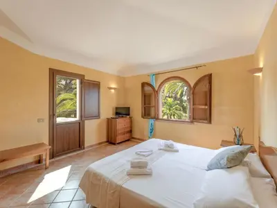 Letto o letti in una camera di Apartment Baia delle Palme-2 by Interhome