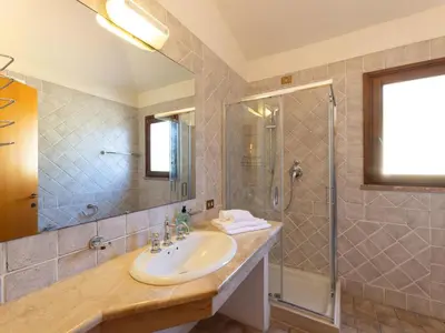 Bagno di Apartment Baia delle Palme-2 by Interhome