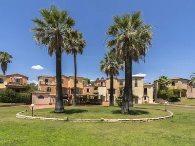 Giardino di Apartment Baia delle Palme-2 by Interhome