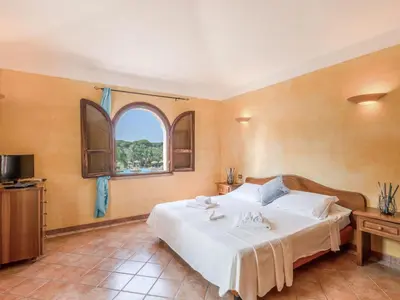 Letto o letti in una camera di Apartment Baia delle Palme-2 by Interhome