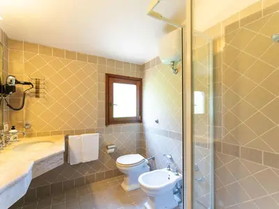 Bagno di Apartment Baia delle Palme-1 by Interhome