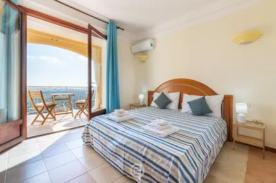 Letto o letti in una camera di Ginestre 13
