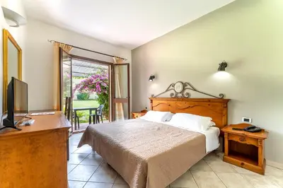 Letto o letti in una camera di Horse Country Resort Congress & Spa - Hotel Ribot
