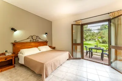 Letto o letti in una camera di Horse Country Resort Congress & Spa - Hotel Ribot