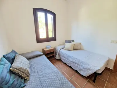 Letto o letti in una camera di Villa Rosa Bestvacationever