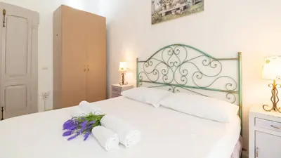 Letto o letti in una camera di Casa della Lavanda Apartment